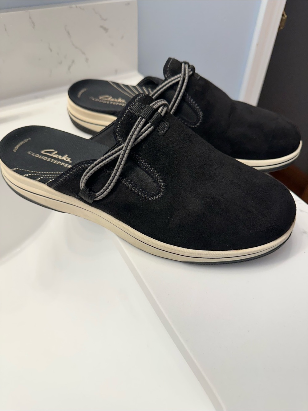 Women’s Clarks Black Cloudsteppers Slip-On shoe in faux suede